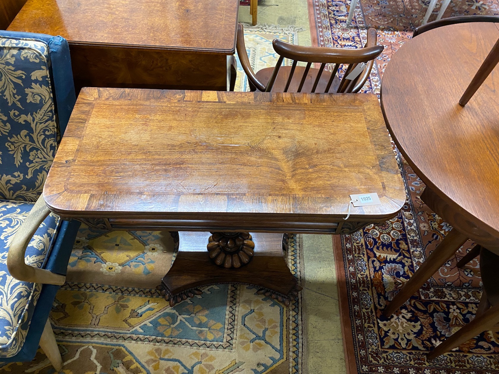 A William IV rosewood folding card table, width 92cm, depth 45cm, height 74cm
